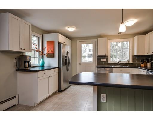 897 Salem End Road Framingham, MA 01702 - Photo 10 of 27 a kitchen with stainless steel appliances granite countertop a stove a sink and a refrigerator
