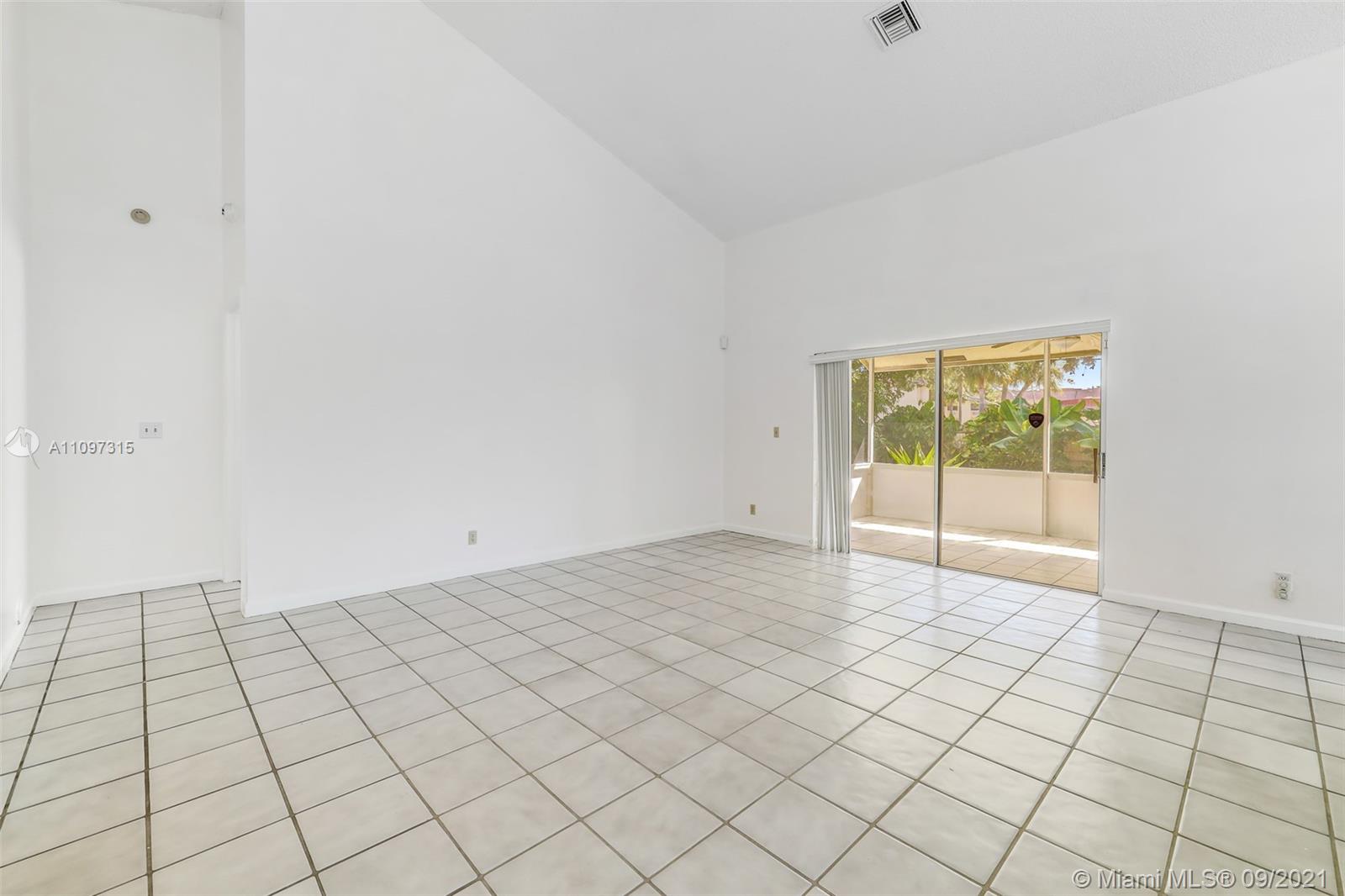5140 Northwest 5th Avenue Boca Raton, FL 33487 - Photo 11 of 44 a view of an empty room and window