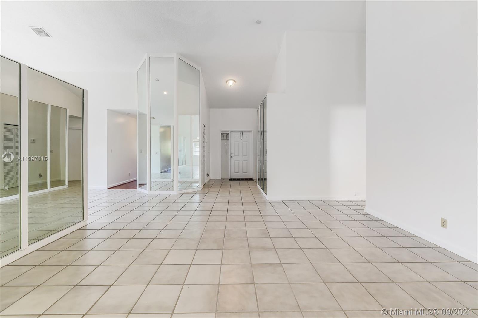 5140 Northwest 5th Avenue Boca Raton, FL 33487 - Photo 13 of 44 a view of an empty room and window