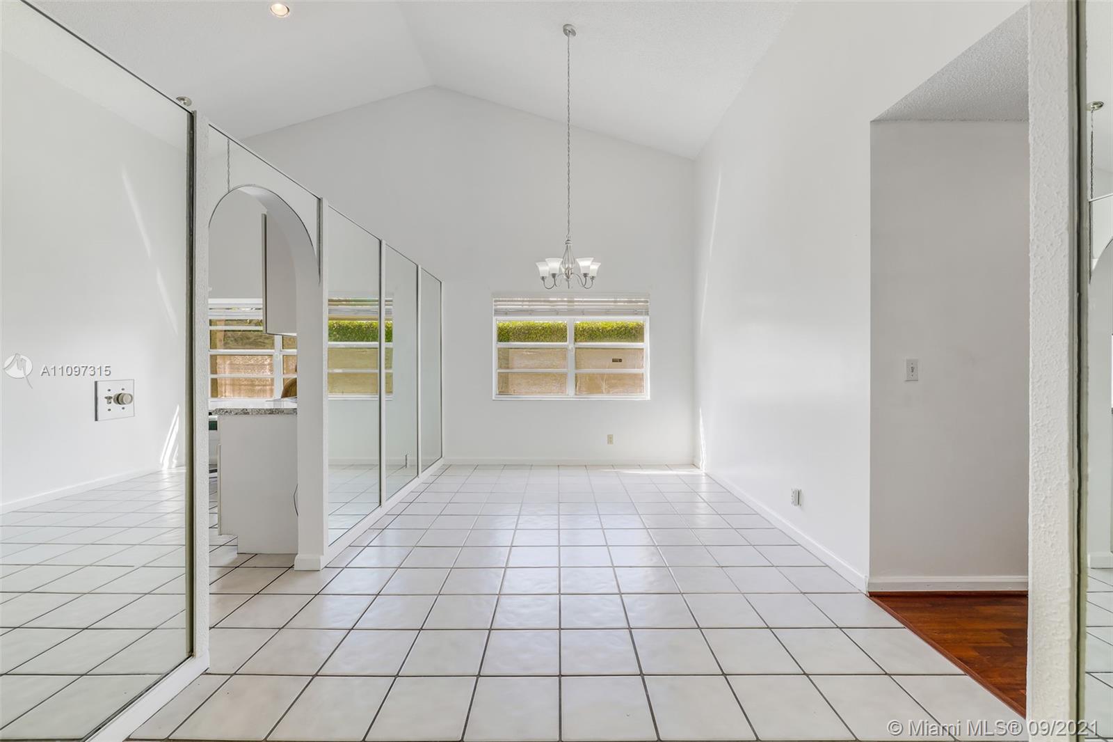 5140 Northwest 5th Avenue Boca Raton, FL 33487 - Photo 16 of 44 a view of an empty room and window