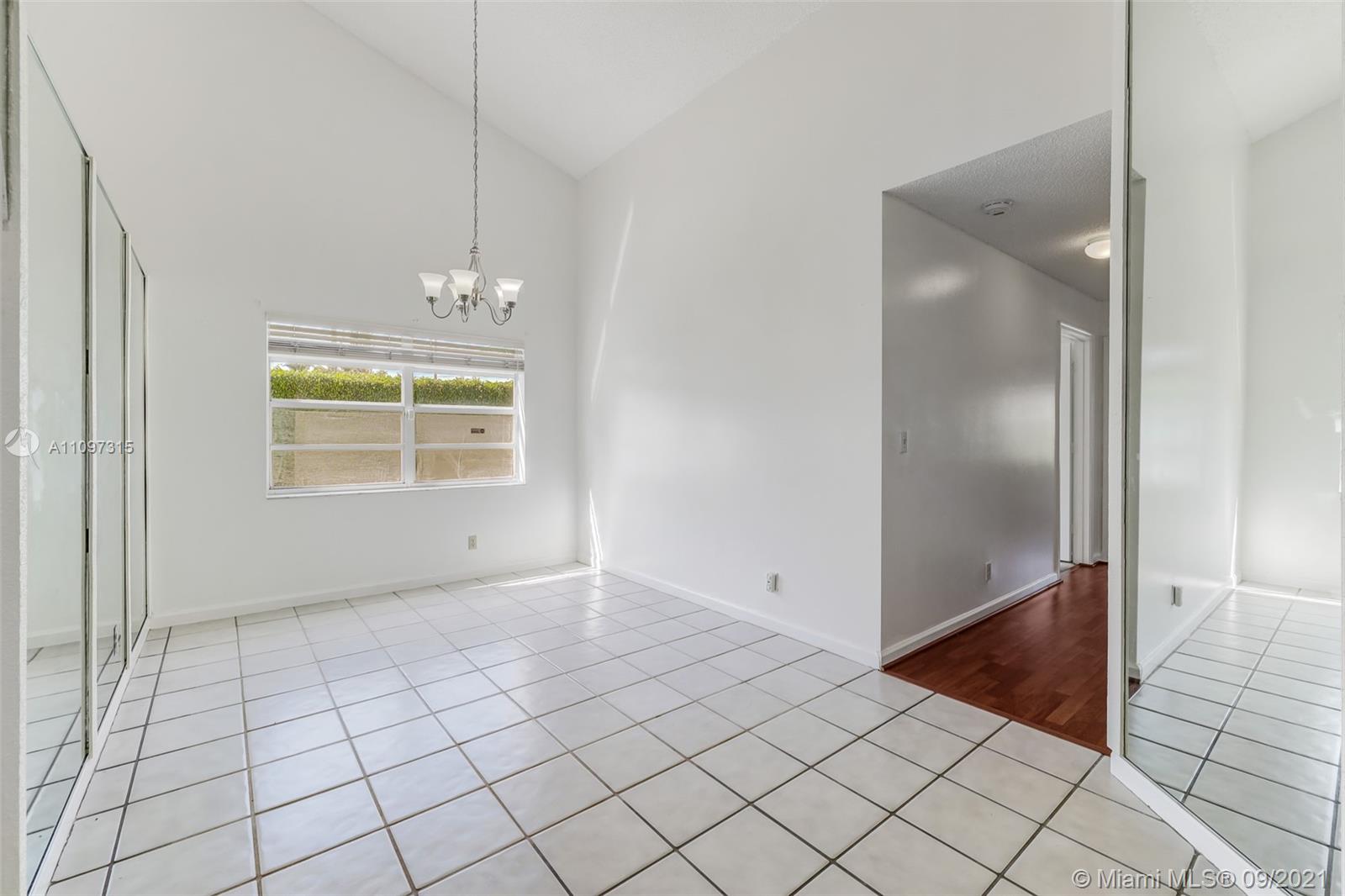 5140 Northwest 5th Avenue Boca Raton, FL 33487 - Photo 17 of 44 a view of an empty room and window