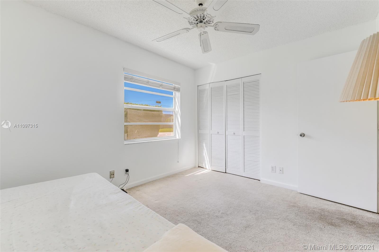 5140 Northwest 5th Avenue Boca Raton, FL 33487 - Photo 27 of 44 a view of an empty room with a window