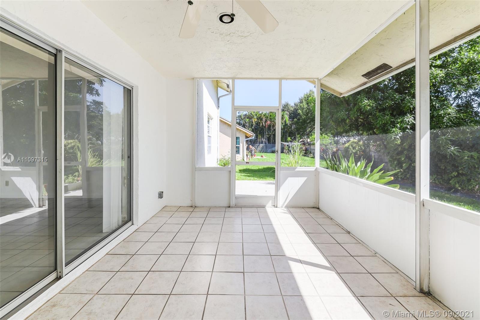 5140 Northwest 5th Avenue Boca Raton, FL 33487 - Photo 32 of 44 a view of a room with a large window