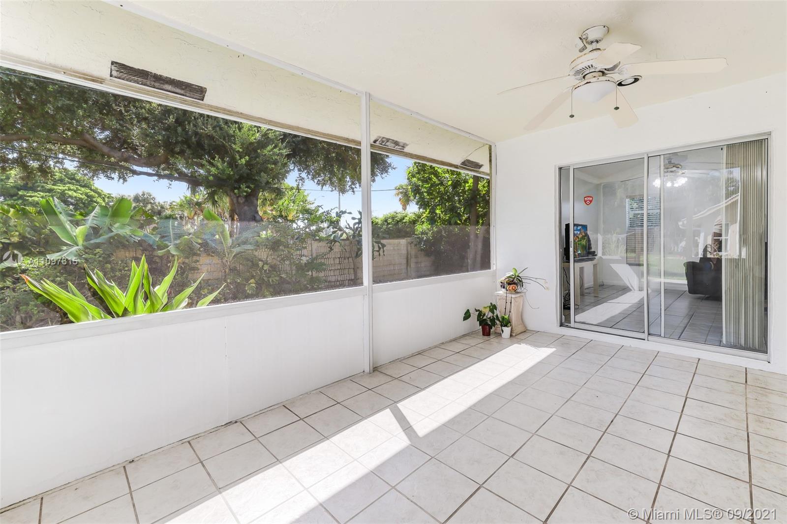5140 Northwest 5th Avenue Boca Raton, FL 33487 - Photo 33 of 44 a large white room with a large windows