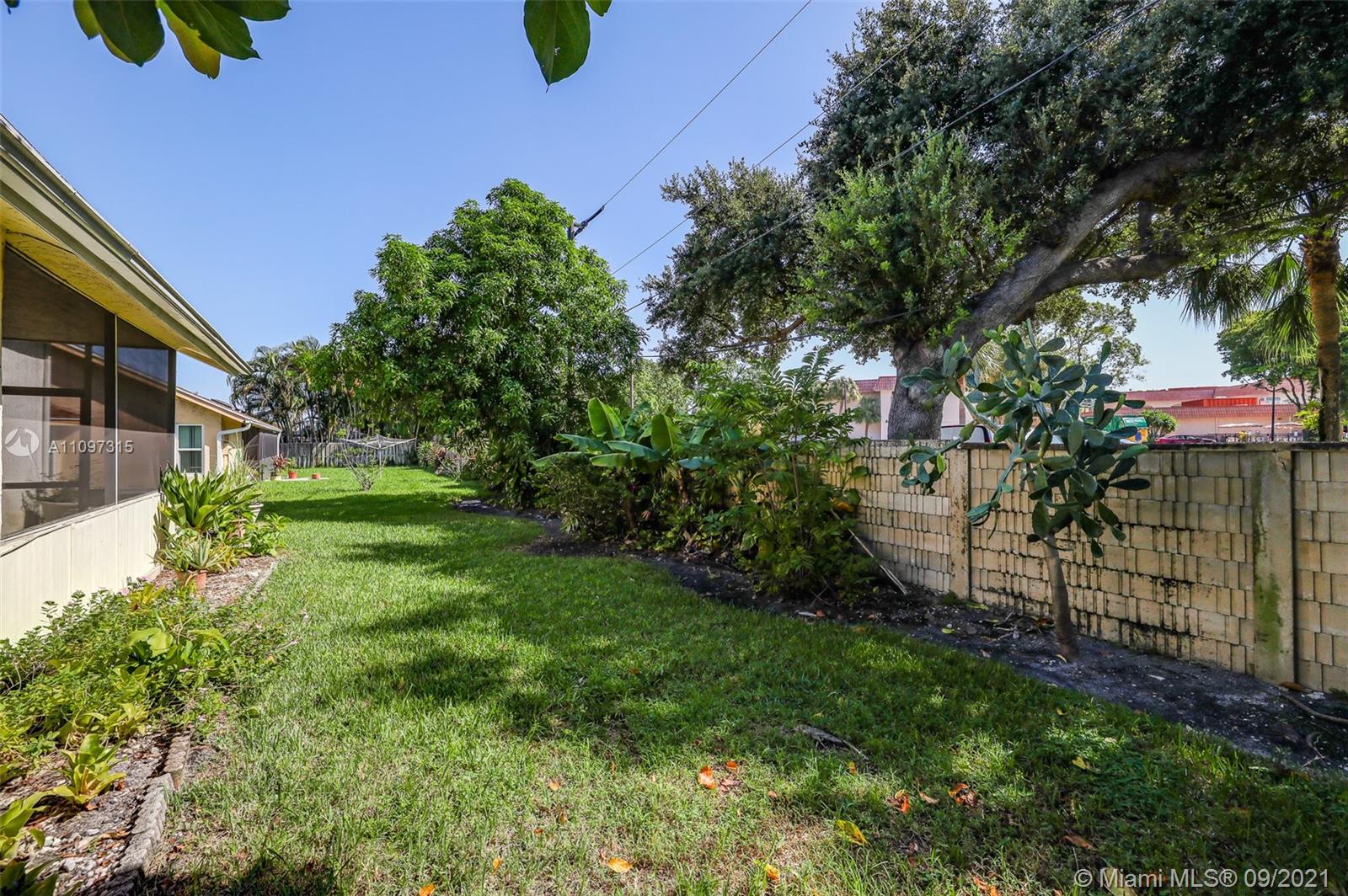 5140 Northwest 5th Avenue Boca Raton, FL 33487 - Photo 8 of 44 a view of a backyard