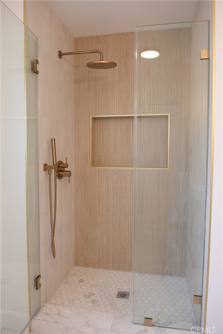 1466 East Helmick Street Carson, CA 90746 - Photo 23 of 32 a bathroom with a shower