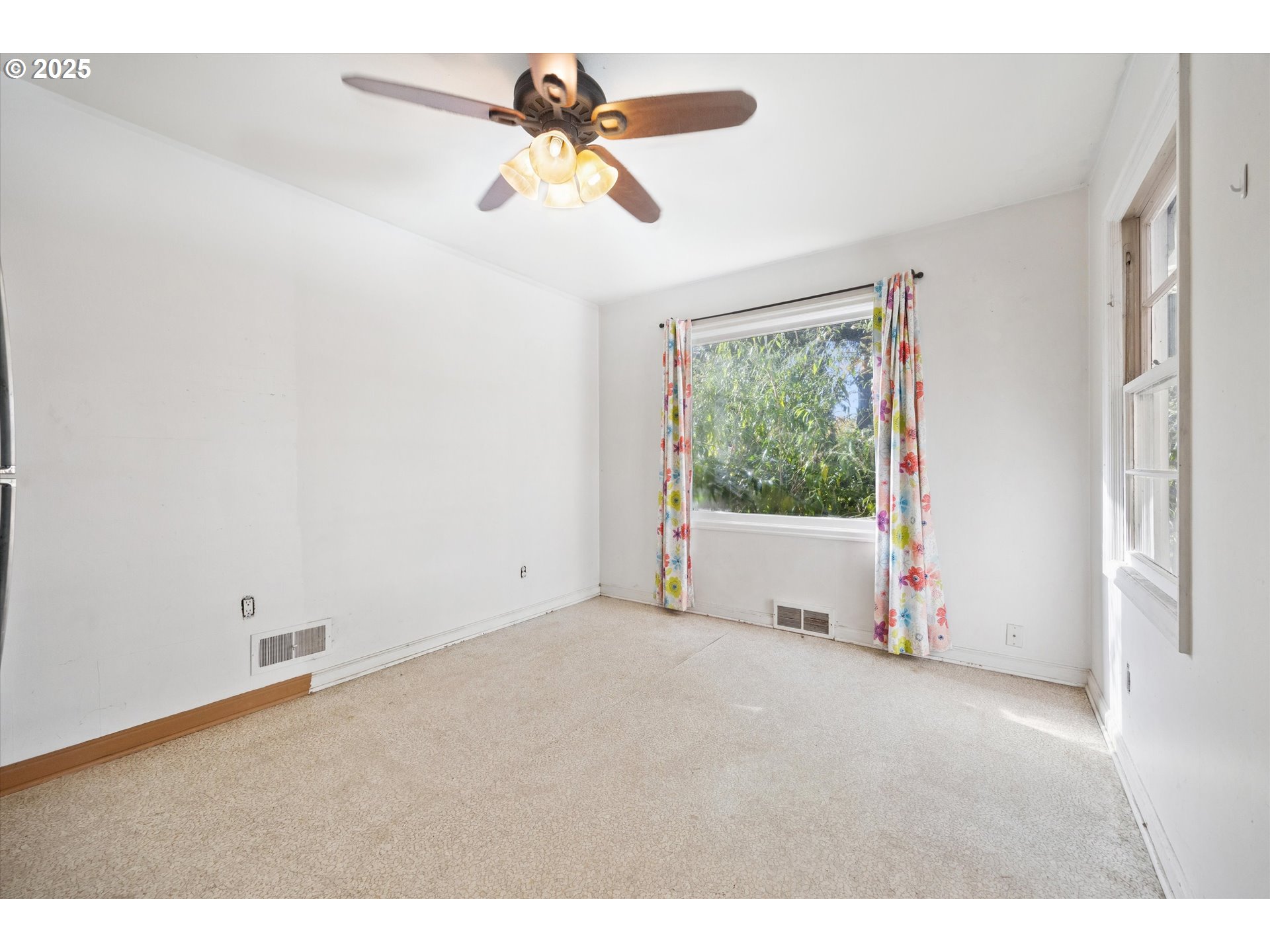 1115 Northeast 106th Avenue Portland, OR 97220 - Photo 17 of 46 a view of an empty room with a window