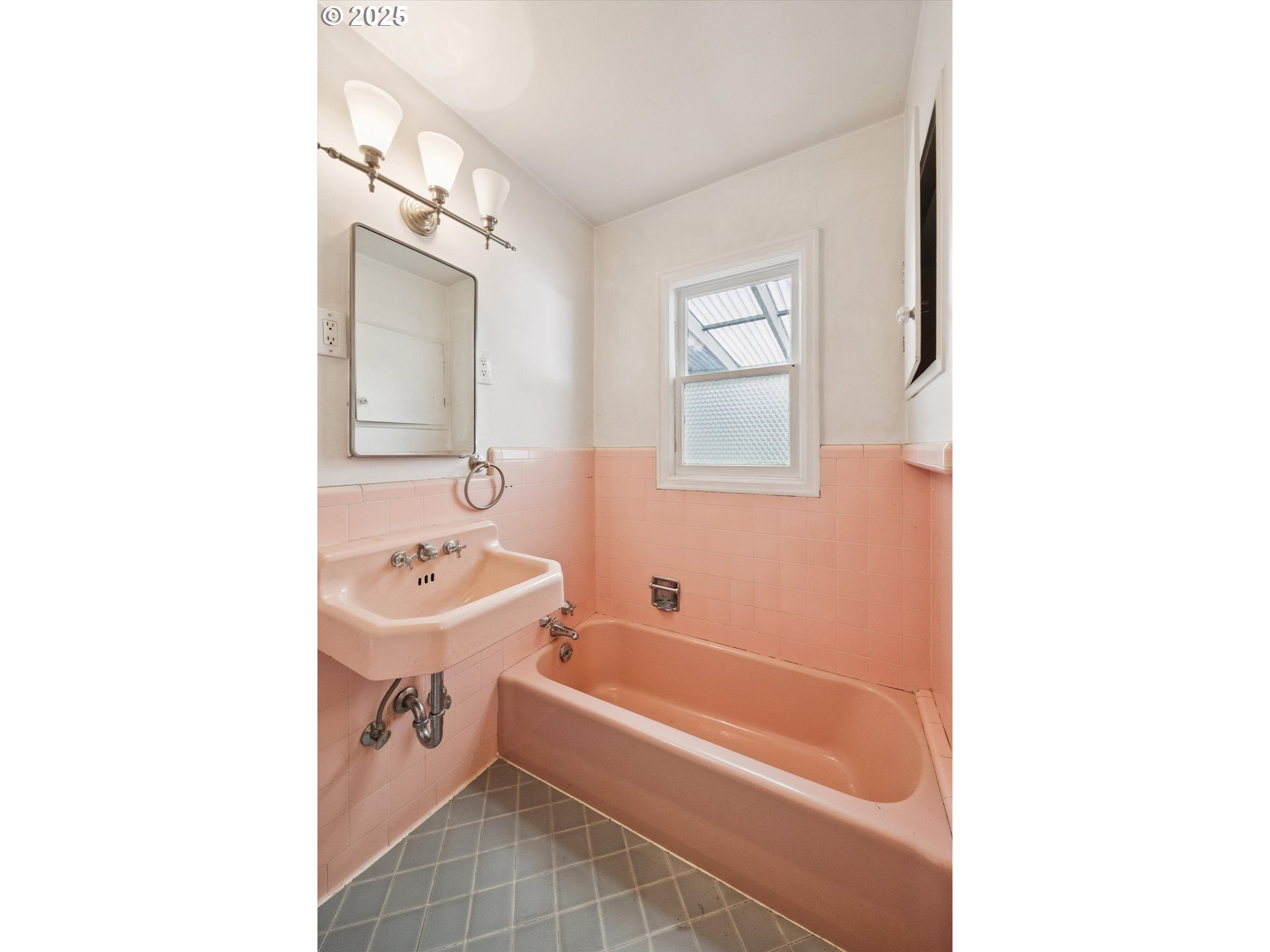 1115 Northeast 106th Avenue Portland, OR 97220 - Photo 23 of 46 a bathroom with a tub sink shower and mirror