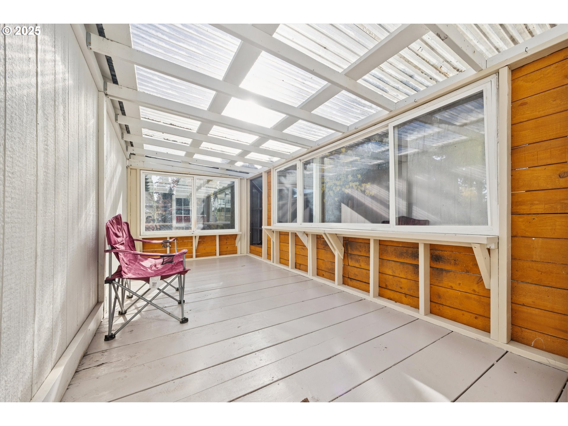 1115 Northeast 106th Avenue Portland, OR 97220 - Photo 37 of 46 a bedroom with a bed and wooden floor