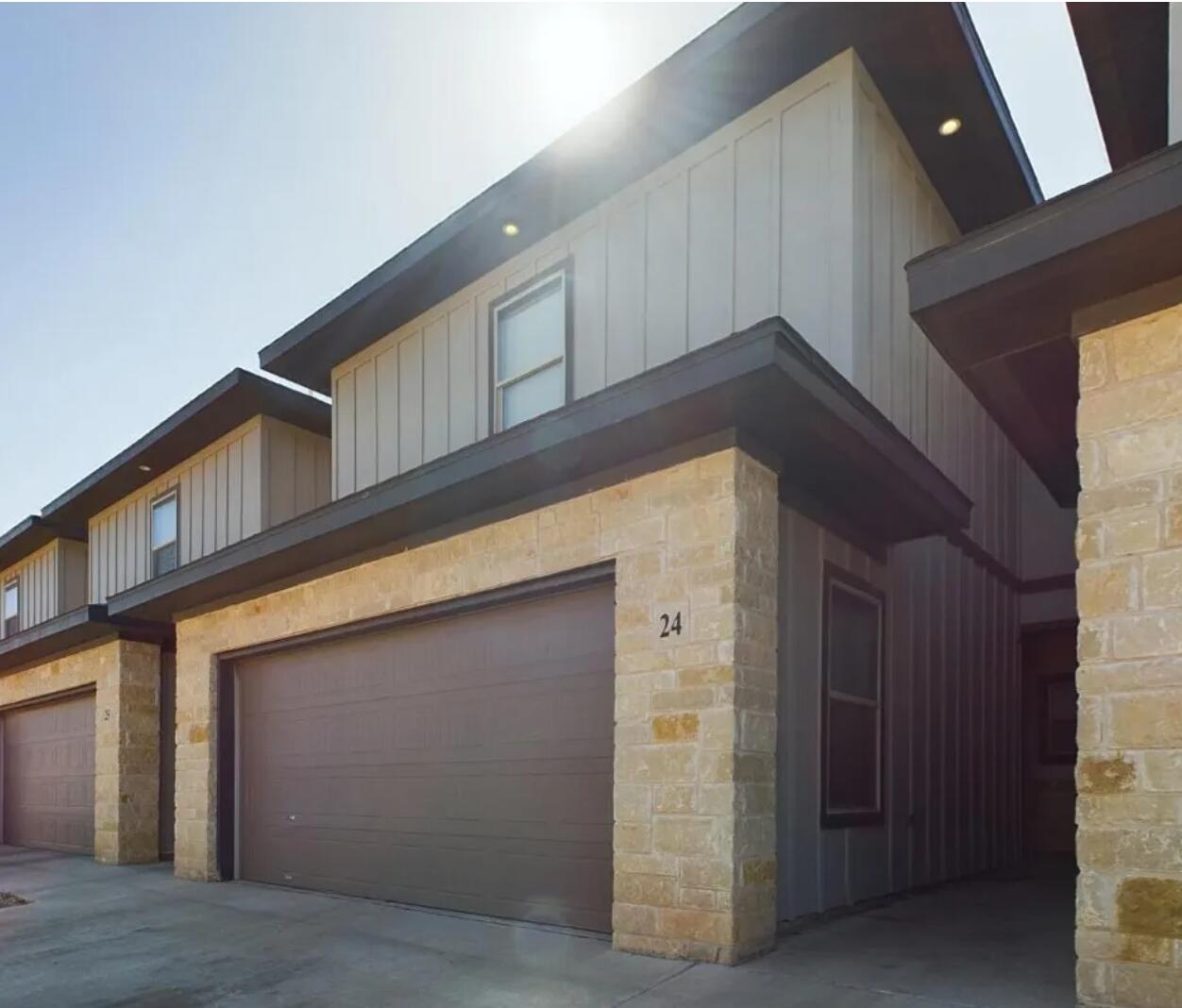 6040 24th Street, Unit 24 Lubbock, TX 79407 - Photo 1 of 12 a view of a house with a door