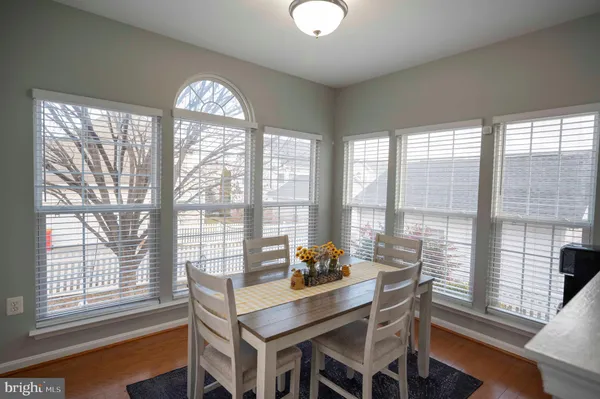 a view of a living room and dining room