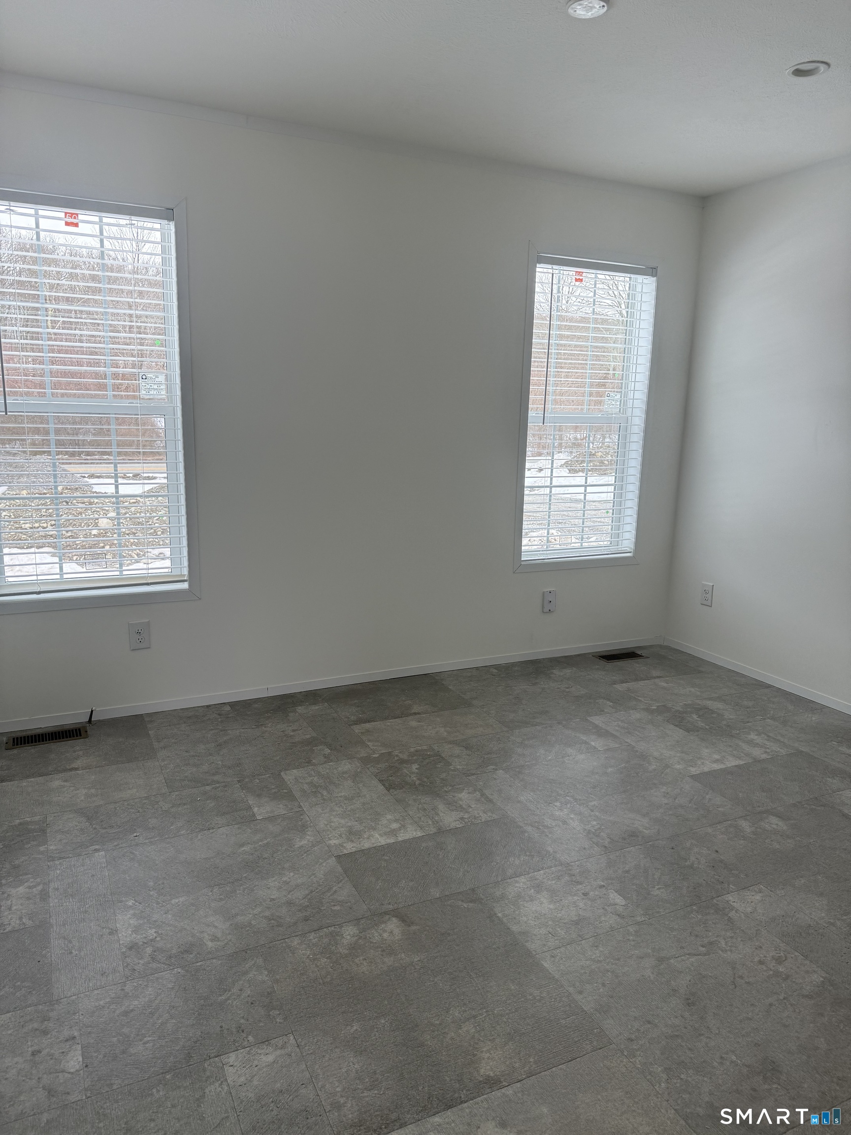 8-421 Norwich-Westerly Road North Stonington, CT 06359 - Photo 5 of 10 an empty room with a window
