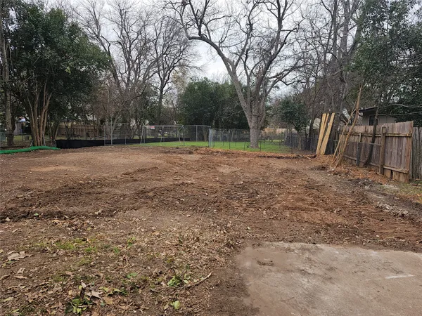 a view of backyard with green space
