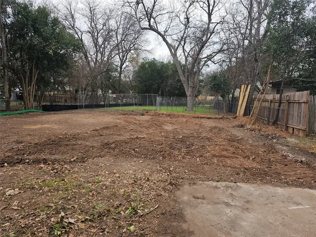 a view of backyard with green space