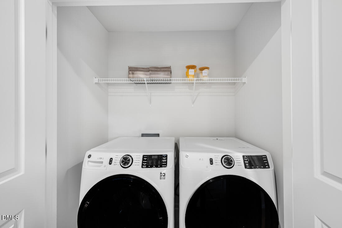 1324 West Garner Road, Unit 103 Garner, NC 27529 - Photo 26 of 27 a utility room with dryer and washer