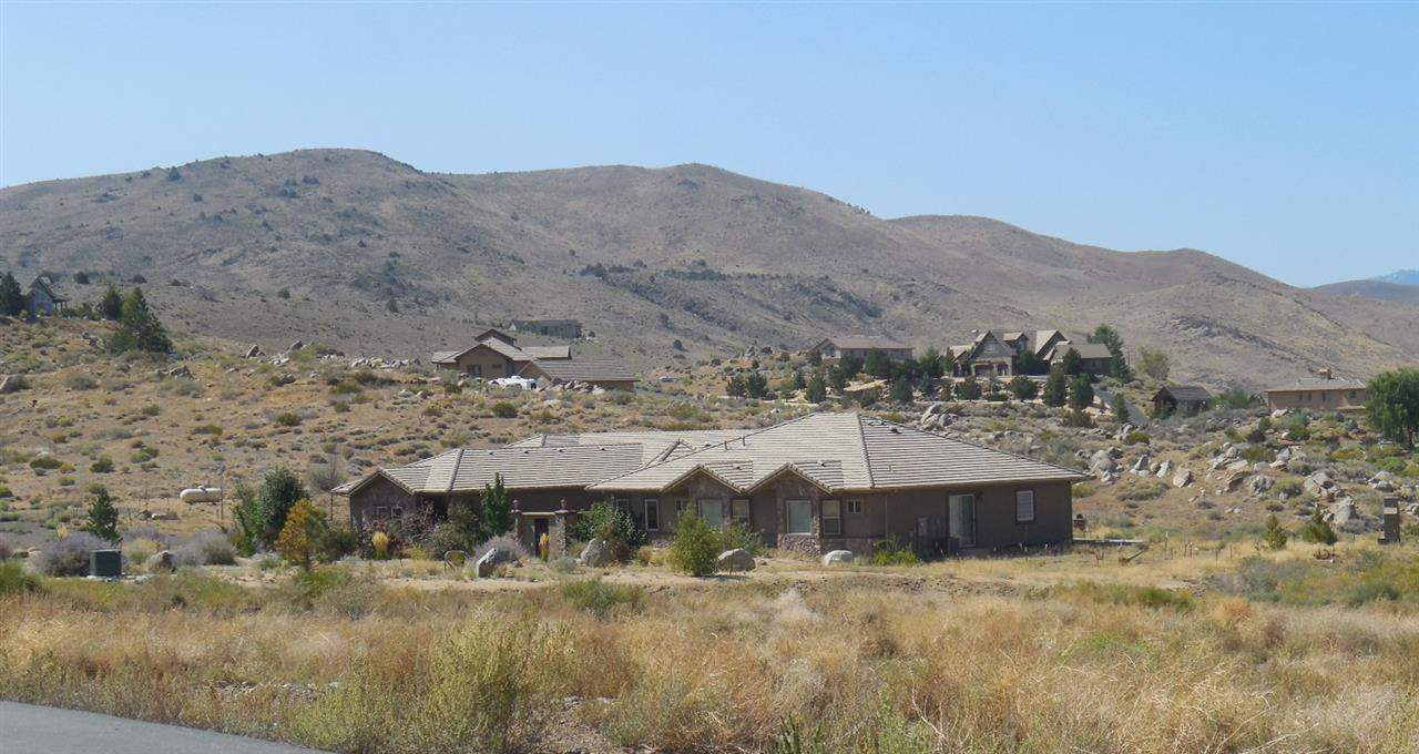 2750 Ramona Road Reno, NV 89521 - Photo 1 of 1 a view of a house with a mountain yard