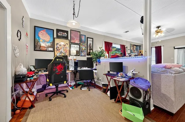 a view of a workspace with furniture and toys