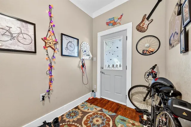 a view of a room with rack and bicycle