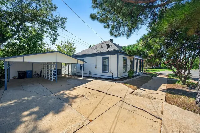 a front view of a house with yard