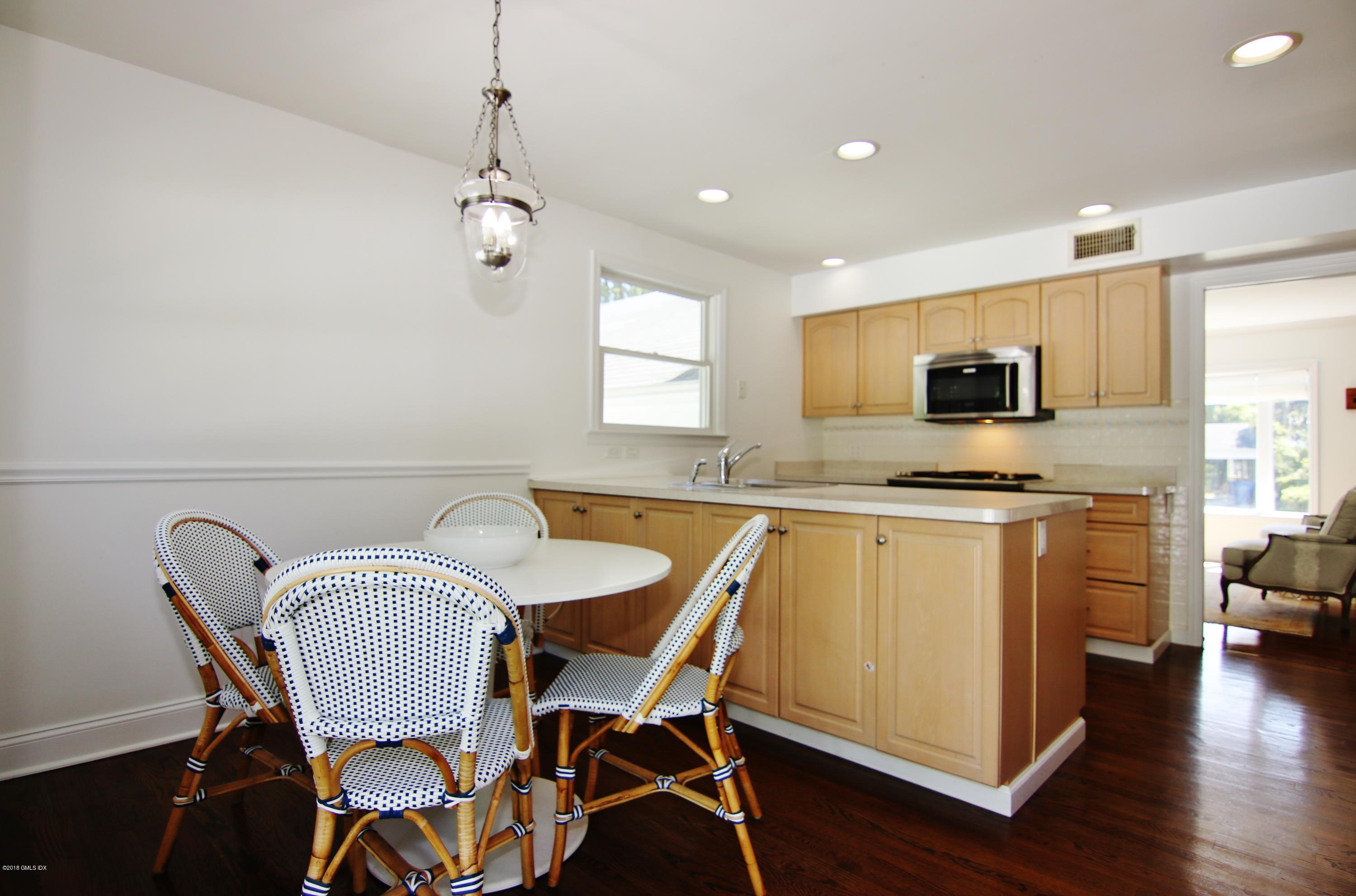 9 Bonwit Road Riverside, CT 06878 - Photo 14 of 29 a view of kitchen with granite countertop cabinets table and chairs