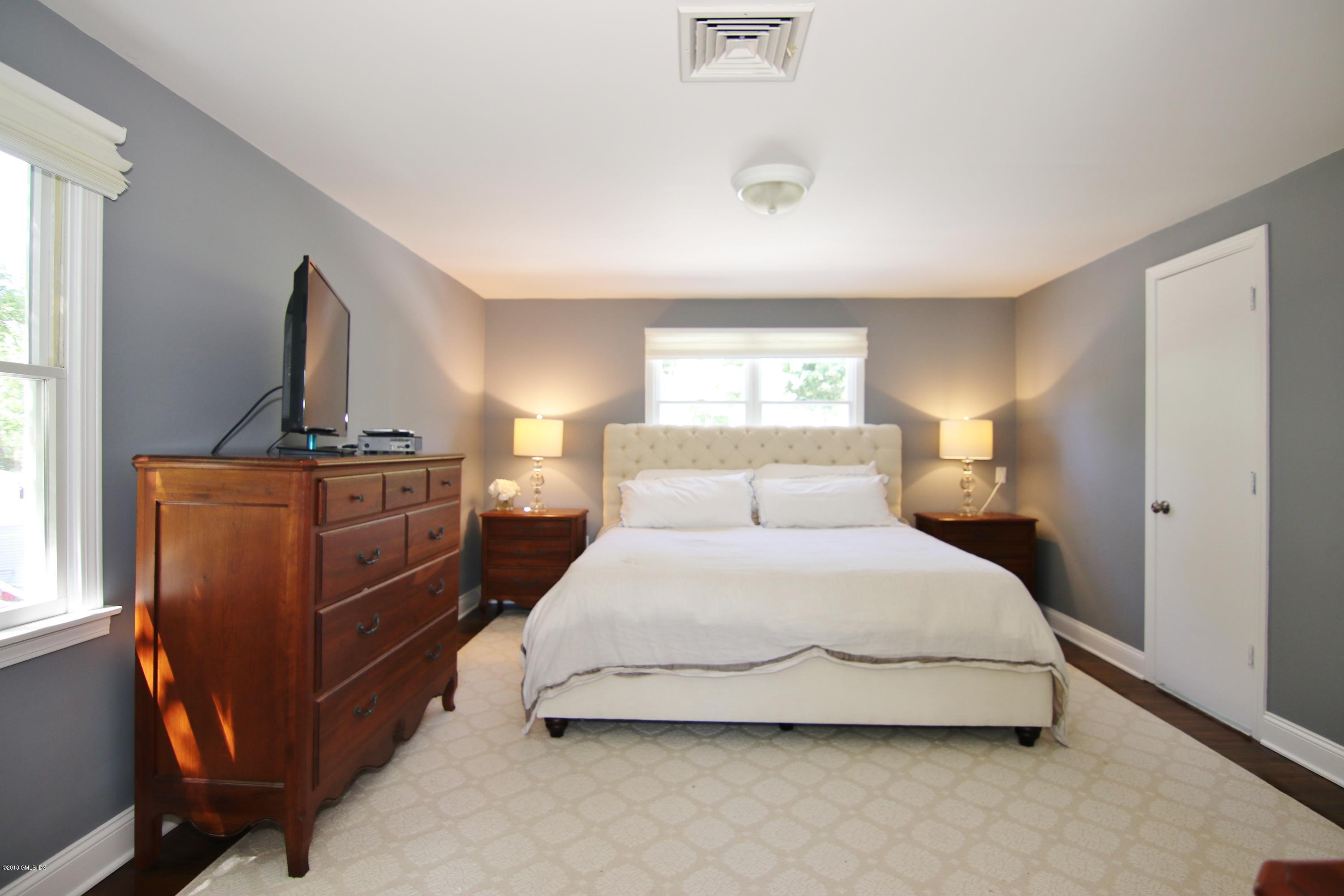 9 Bonwit Road Riverside, CT 06878 - Photo 15 of 29 a bedroom with a bed and window
