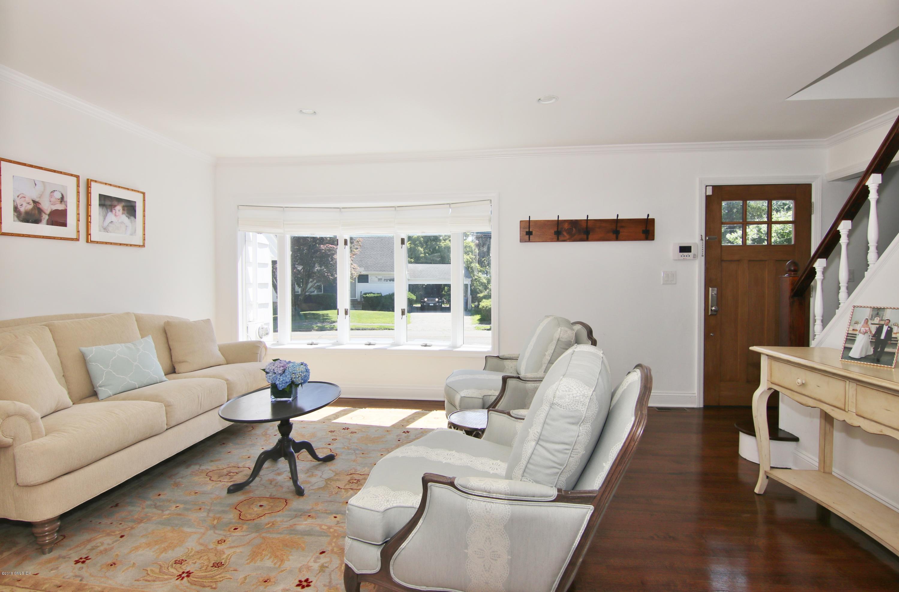 9 Bonwit Road Riverside, CT 06878 - Photo 4 of 29 a living room with furniture and a flat screen tv