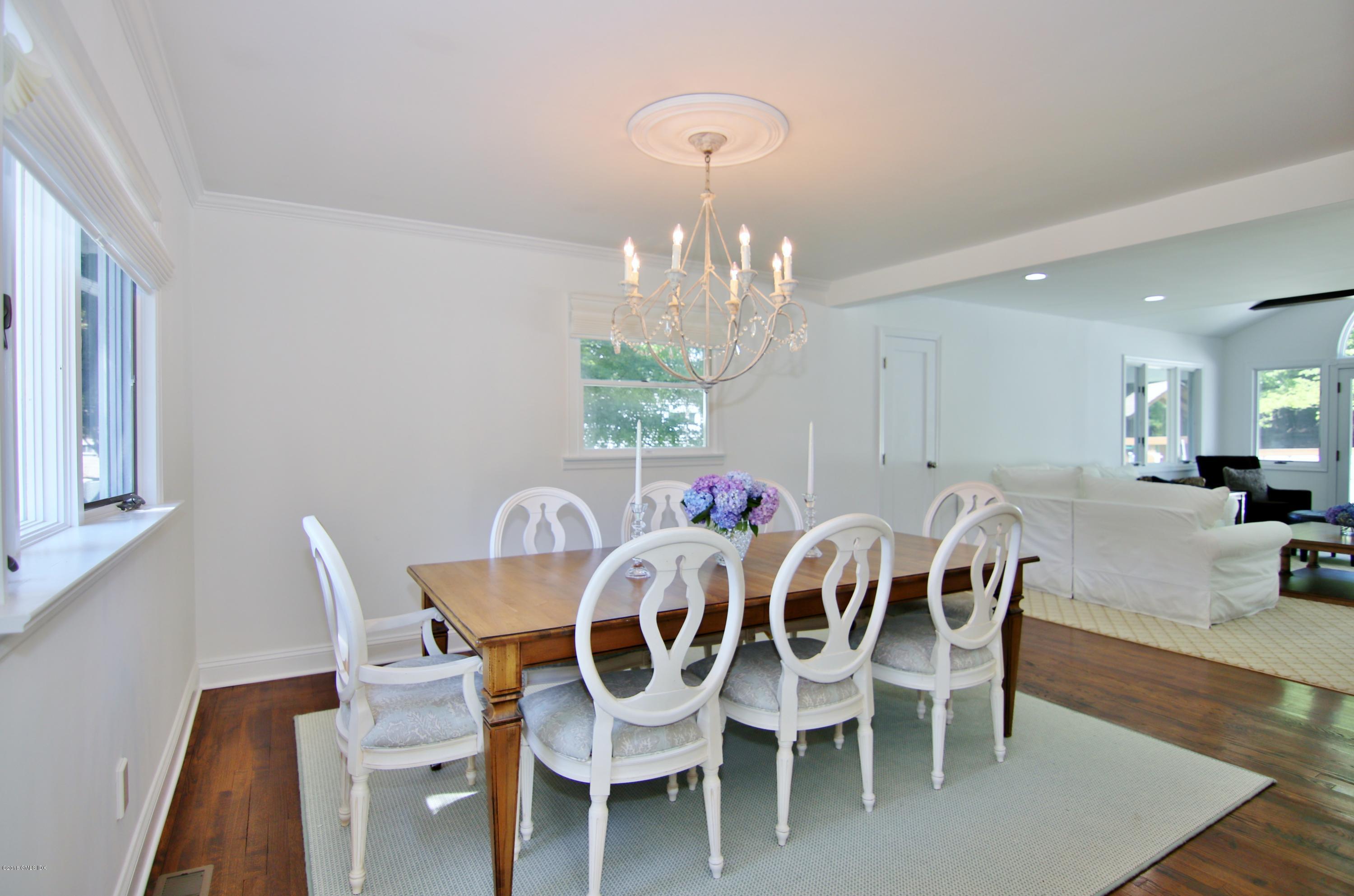 9 Bonwit Road Riverside, CT 06878 - Photo 5 of 29 a view of a dining room with furniture and wooden floor
