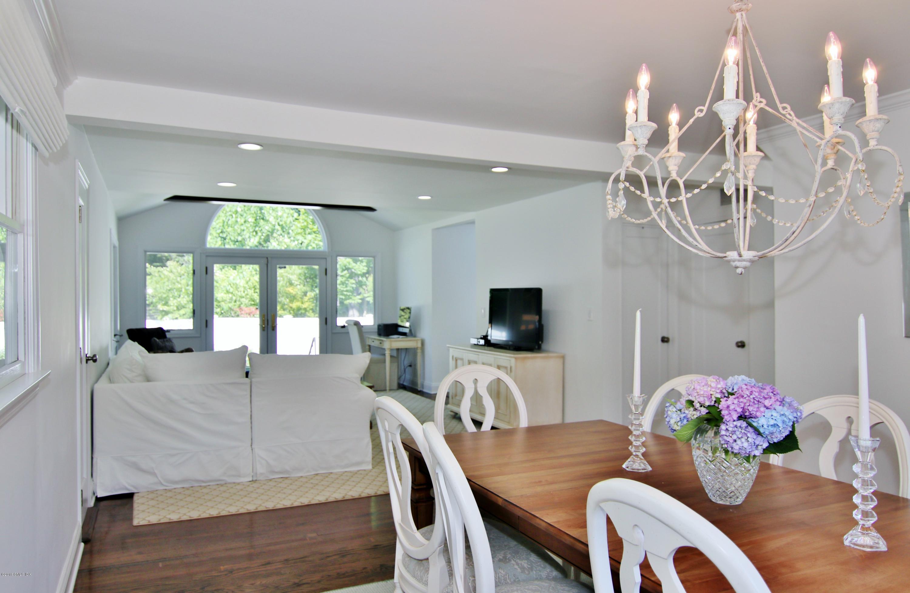 9 Bonwit Road Riverside, CT 06878 - Photo 6 of 29 a view of a dining room with furniture and a large window