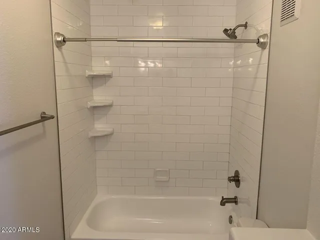 a close up of a bathtub in a bathroom