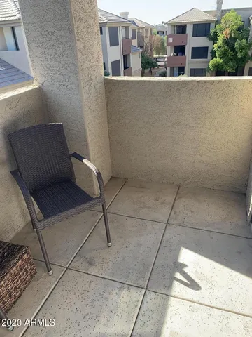 a view of a building from a balcony