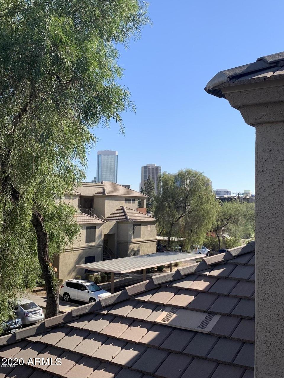3848 North 3rd Avenue, Unit 3020 Phoenix, AZ 85013 - Photo 18 of 20 a picture of a table and chairs