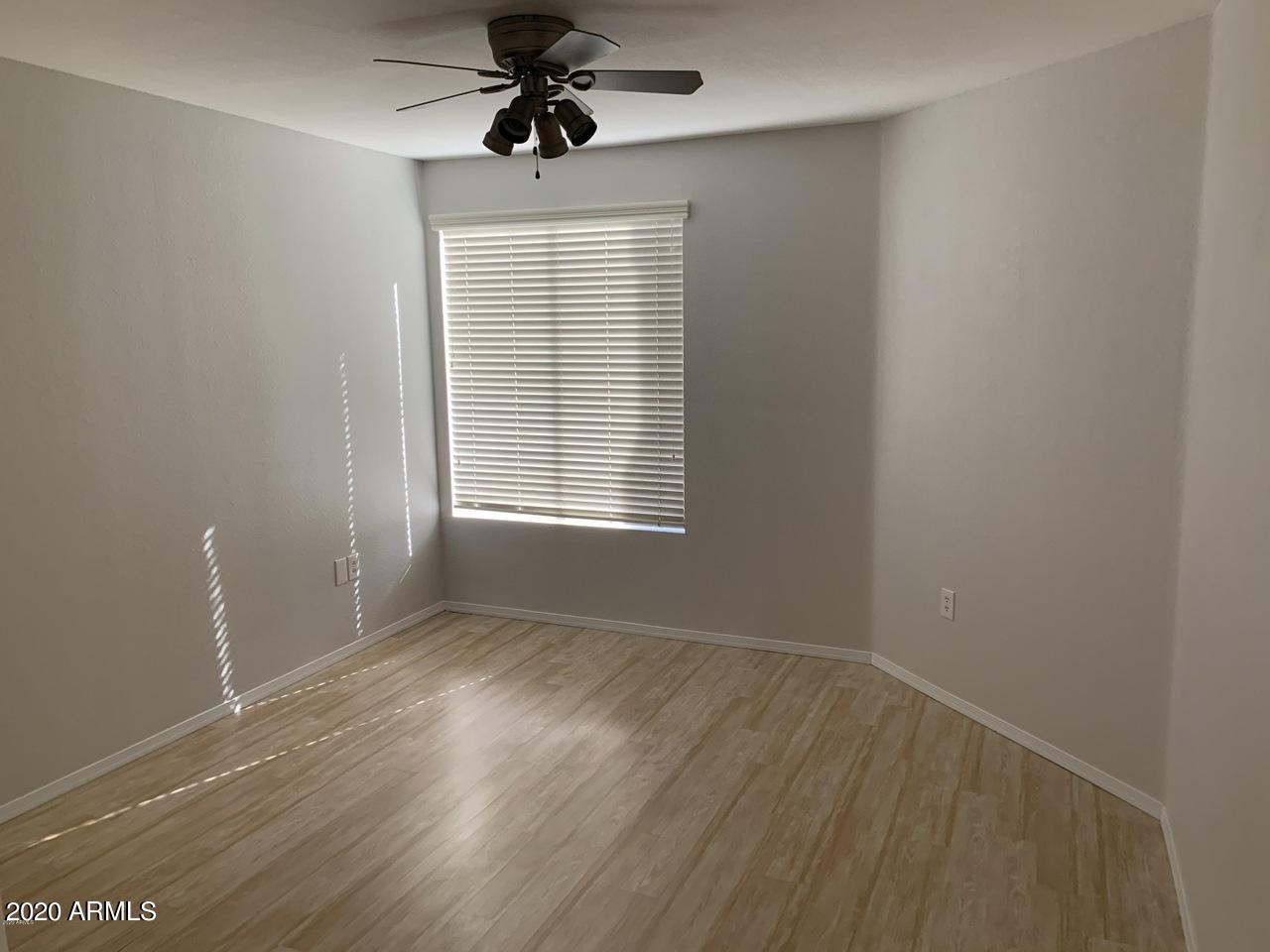 3848 North 3rd Avenue, Unit 3020 Phoenix, AZ 85013 - Photo 8 of 20 a view of an empty room with a window