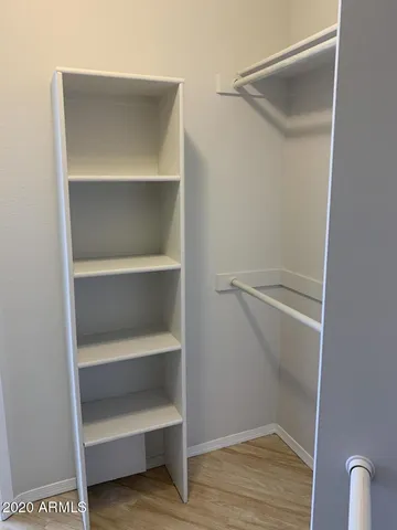a view of an empty walk in closet