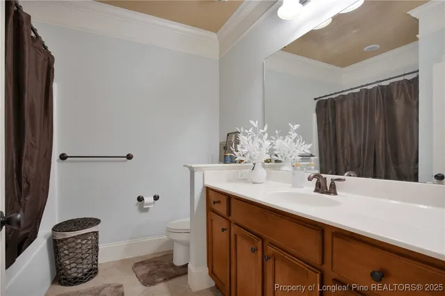 a bedroom with bed and window