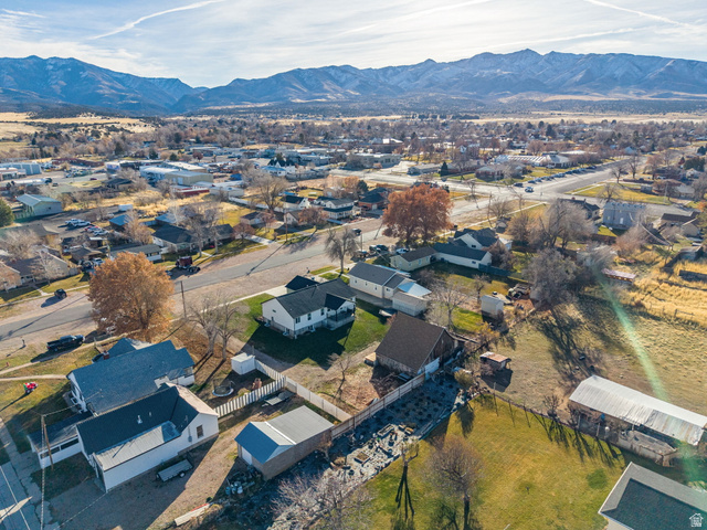 75 North 100th Street West Fillmore, UT 84631 - Photo 58 of 62 Aerial perspective of suburban area featuring a mountainous background