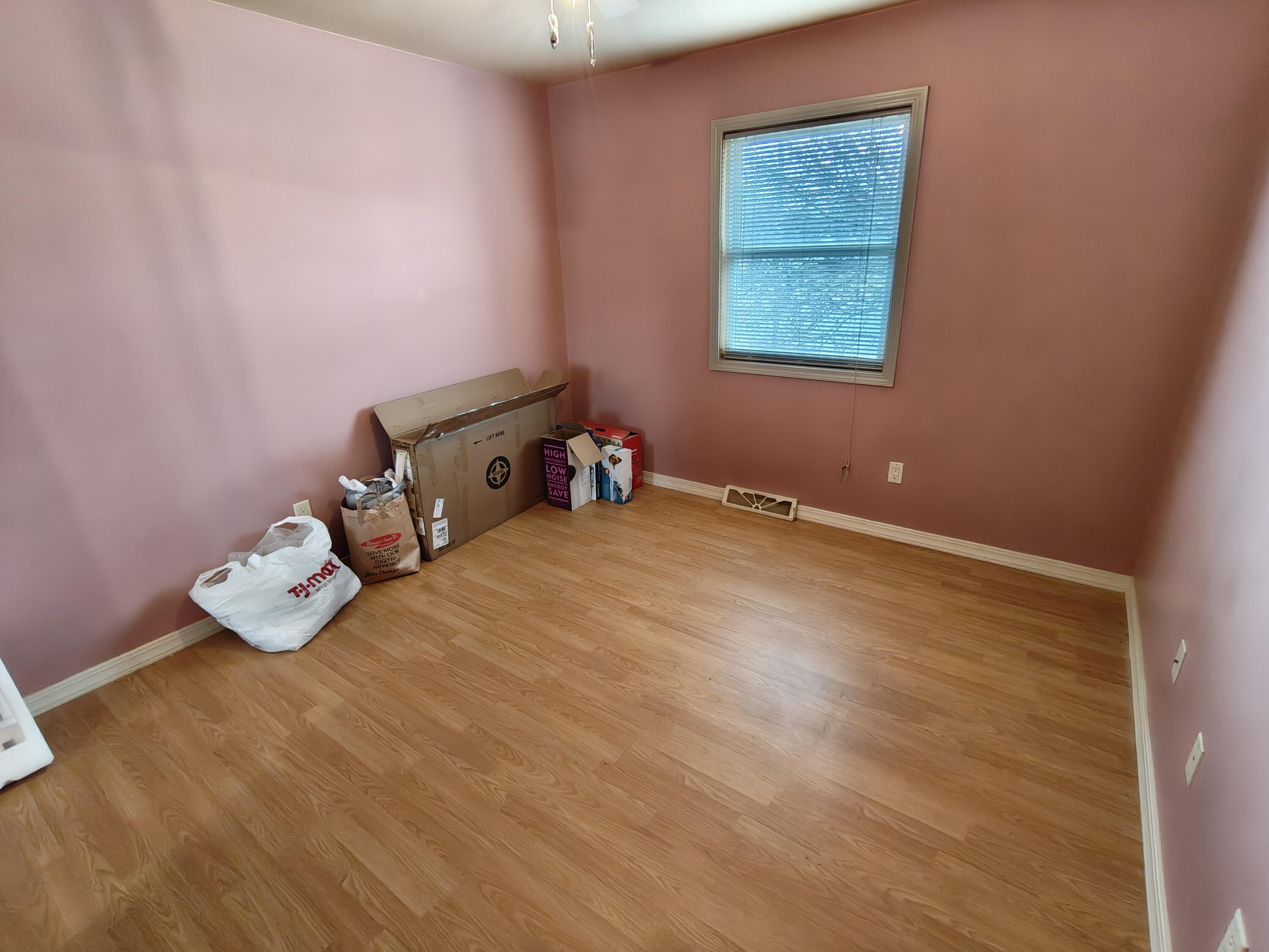 134 Elm Court Hebron, IN 46341 - Photo 15 of 36 a room with a bed and a window