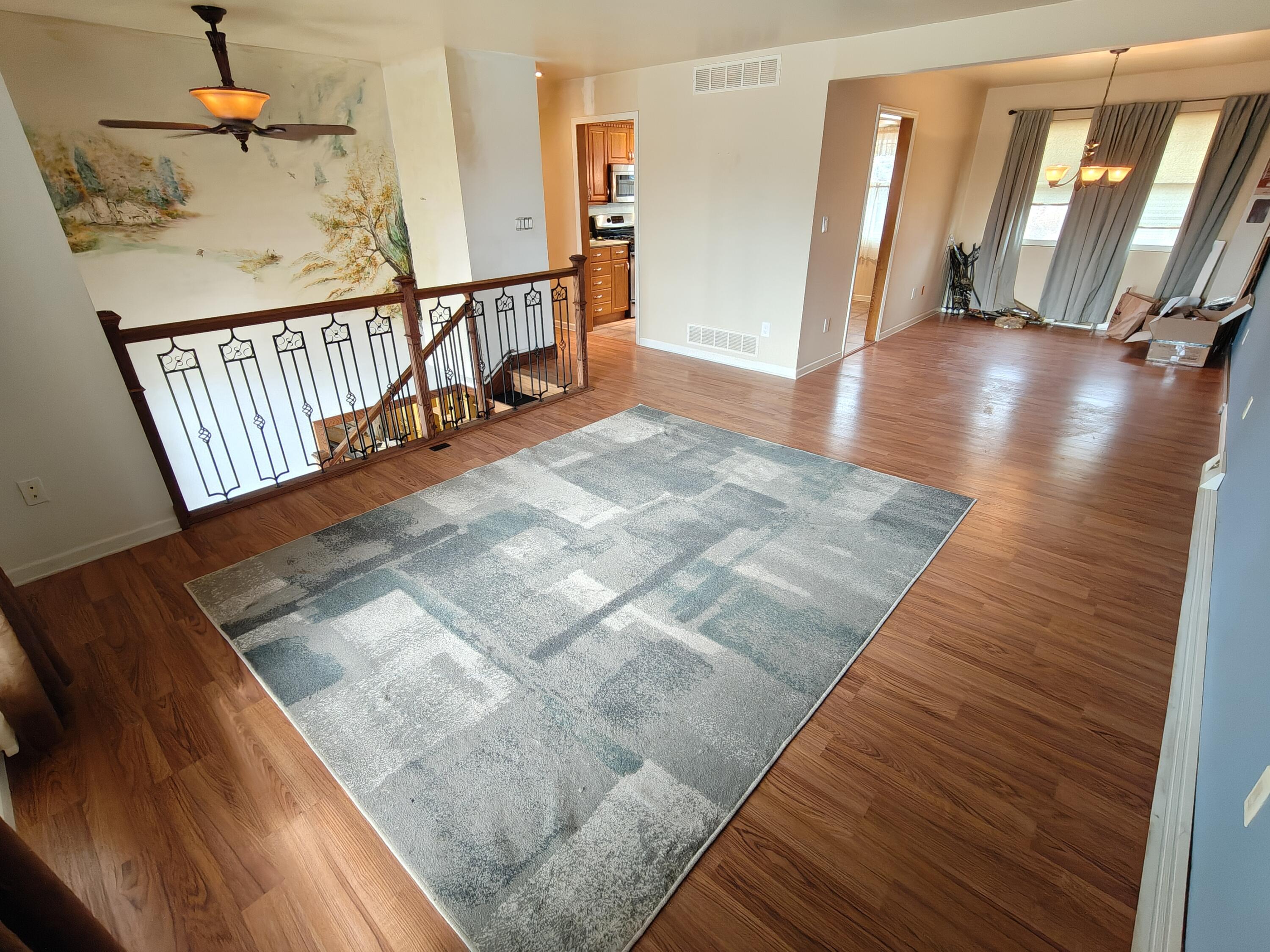 134 Elm Court Hebron, IN 46341 - Photo 4 of 36 a view of a hallway with wooden floor
