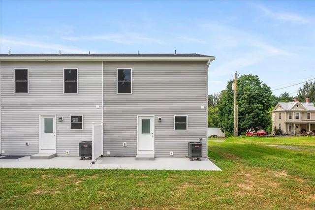 a front view of house with yard