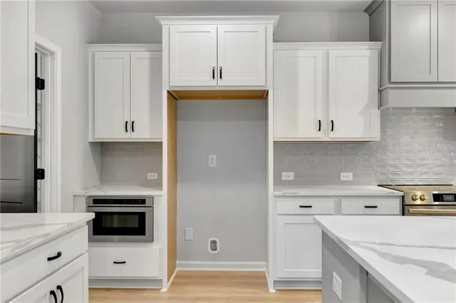 a view of an empty room with closet