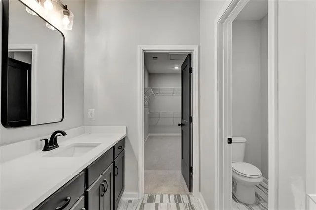 a bathroom with a shower and a toilet