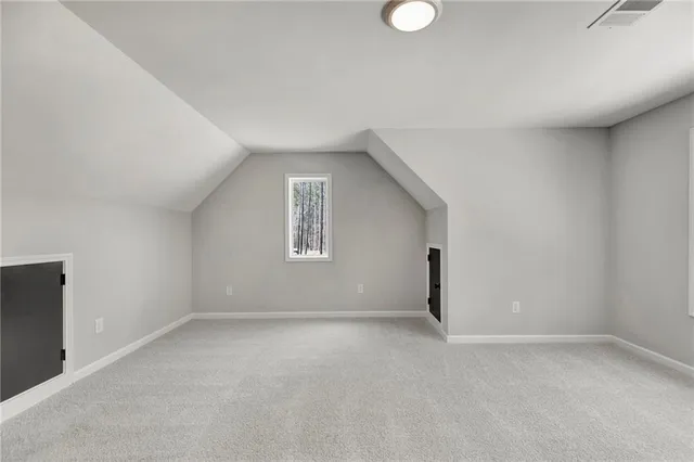 a view of water with large trees