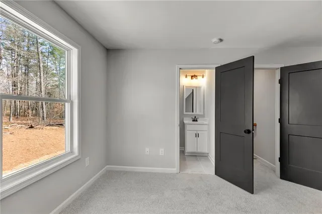 a backyard of a house with a shaded area