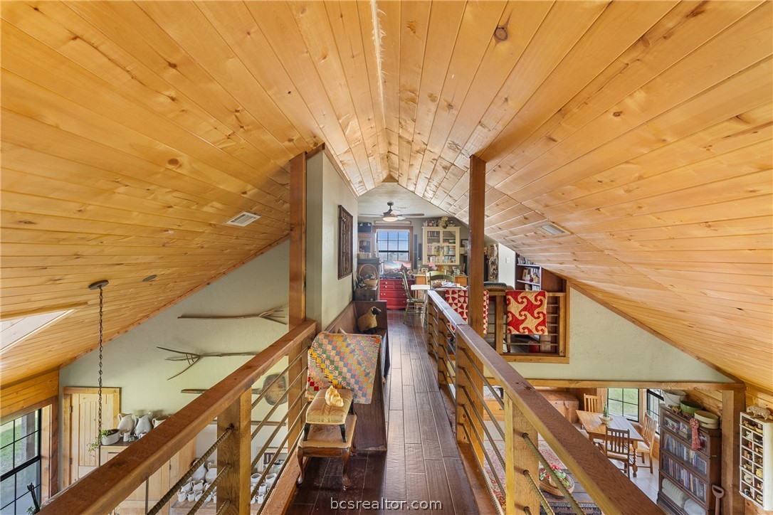 8501 Grassbur Road Bryan, TX 77808 - Photo 26 of 36 a view of a balcony with wooden stairs