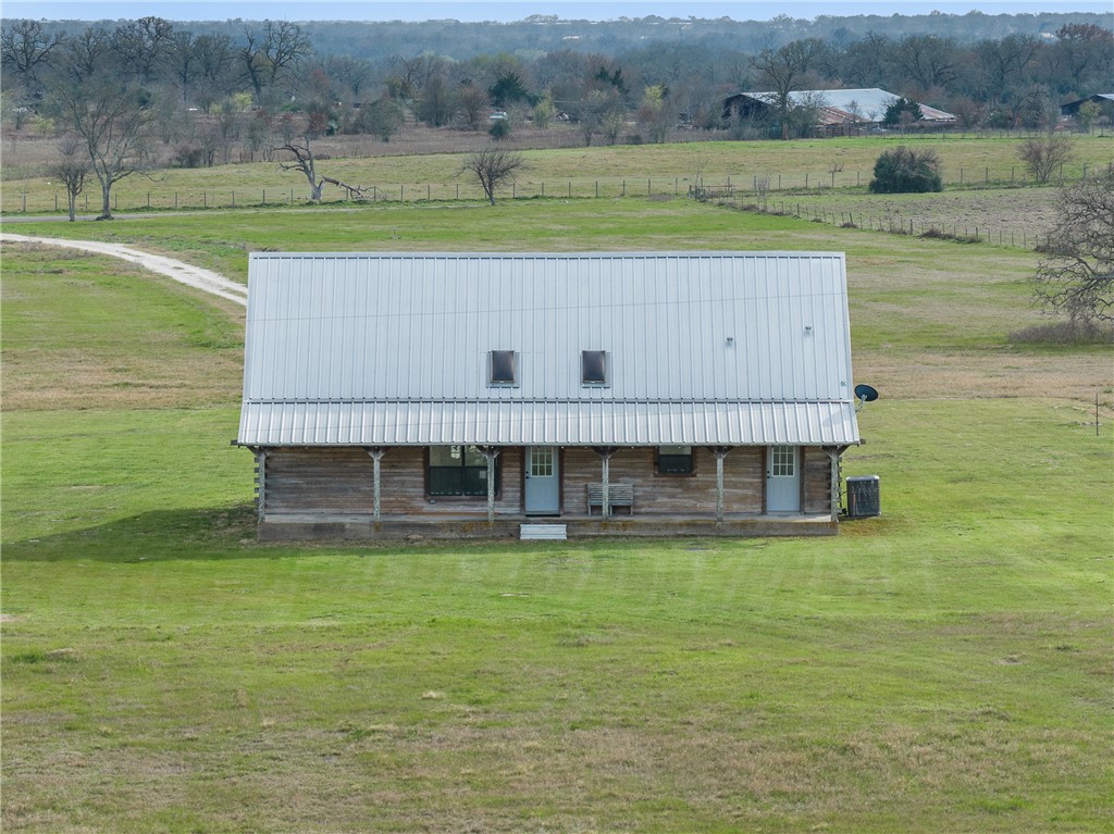 8501 Grassbur Road Bryan, TX 77808 - Photo 31 of 36 a view of a house with a swimming pool