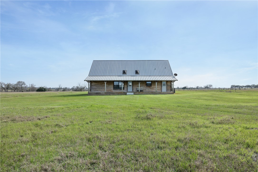 8501 Grassbur Road Bryan, TX 77808 - Photo 32 of 36 a view of a house with a big yard