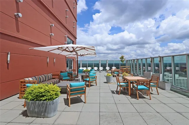 a outdoor space with lots of tables and chairs
