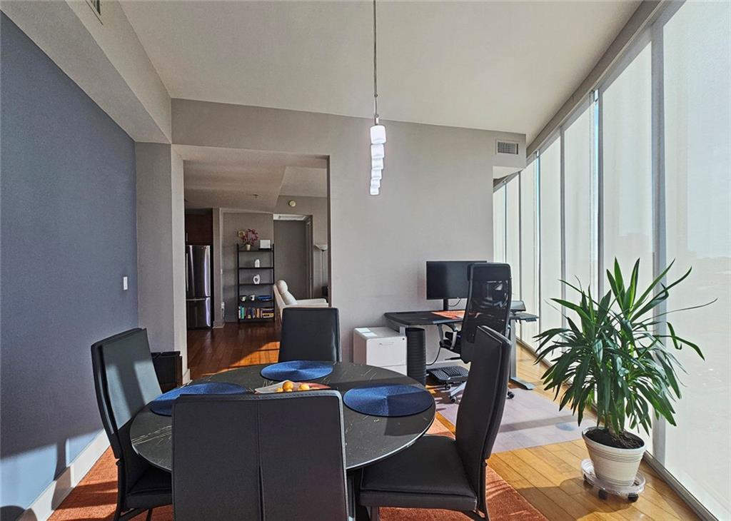4561 Olde Perimeter Way, Unit 1002 Atlanta, GA 30346 - Photo 9 of 43 a work room with furniture and potted plants