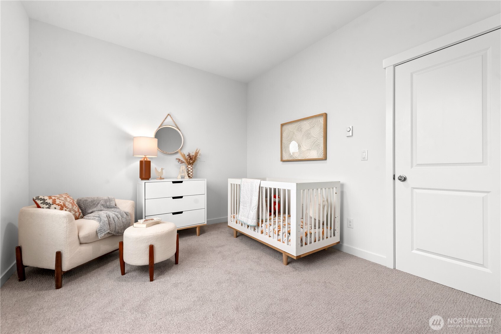 1421 Southwest 111th Lane Seattle, WA 98146 - Photo 22 of 35 a bedroom with furniture and a window