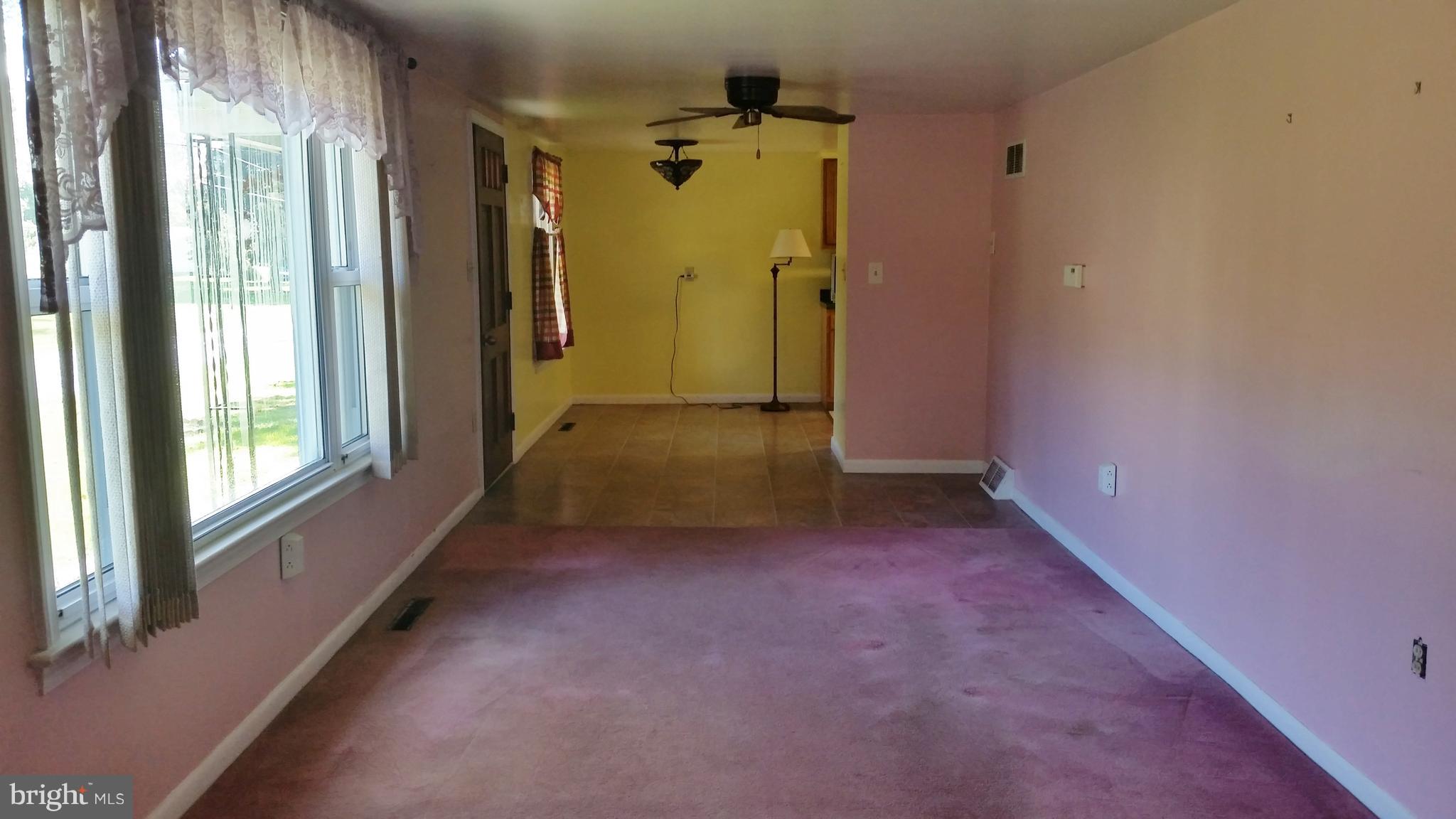 753 Union Church Road Elkton, MD 21921 - Photo 7 of 10 Living Room Into Dining Area