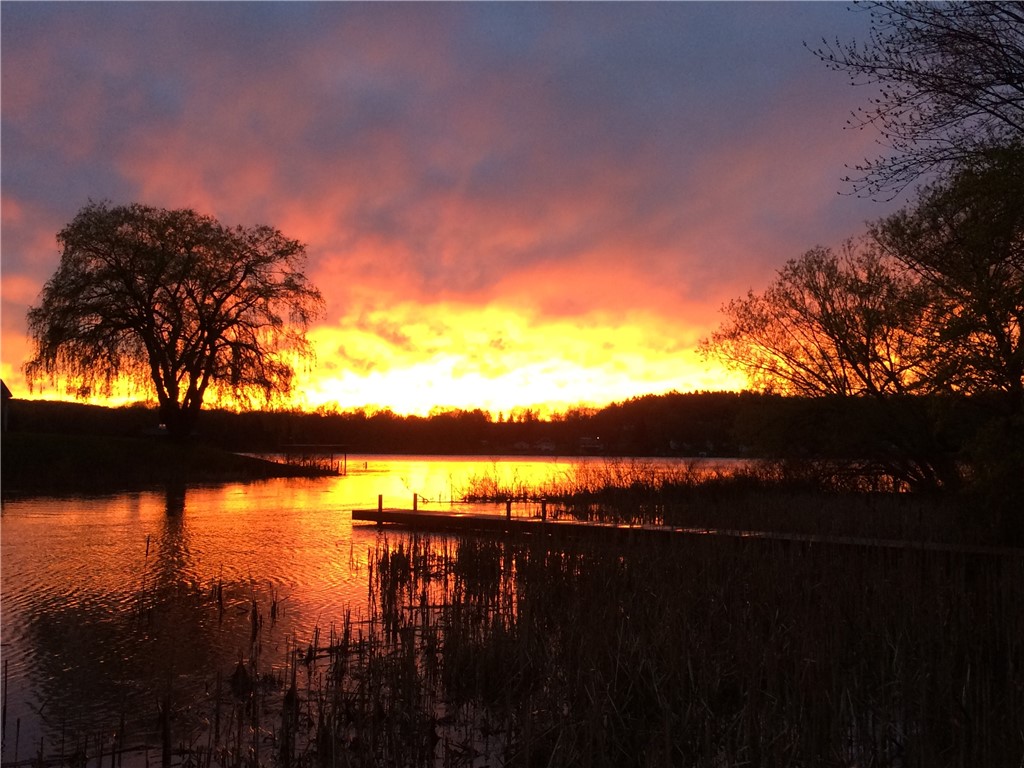 7733 East Port Bay Road Wolcott, NY 14590 - Photo 2 of 49 The sunset from the dock!